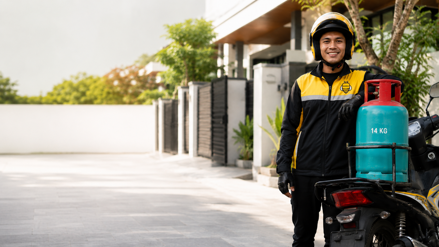 Gasbee delivery rider with LPG cylinder on motorbike